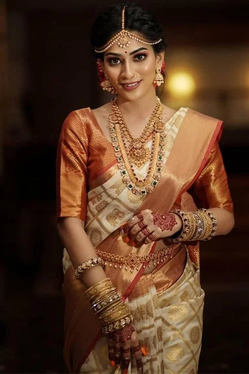 golden saree with red blouse